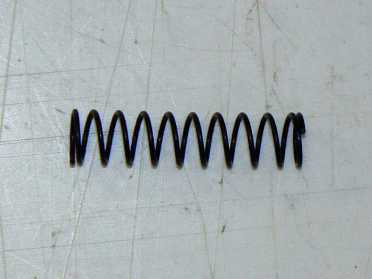 PRUZINA PAKY ZADNIHO MADLA